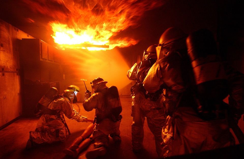 Firemen in a burning House
